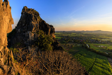 Beautiful sunset on the high mountain in countryside of Thailand.