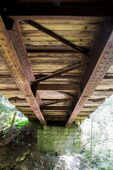 Old wooden bridge bottom view