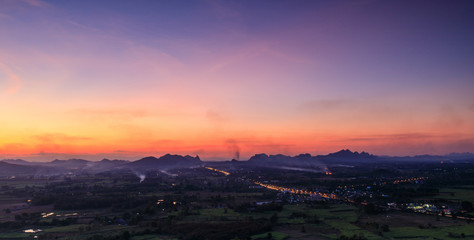 Beautiful sunset on the high mountain in countryside of Thailand.