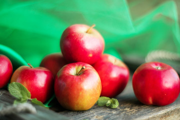 group of fresh red apples on wooden background natural concept for fresh natural food and vitamins