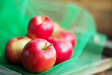 a group of red garden fresh apples on wooden background natural concept for fresh natural food and vitamins