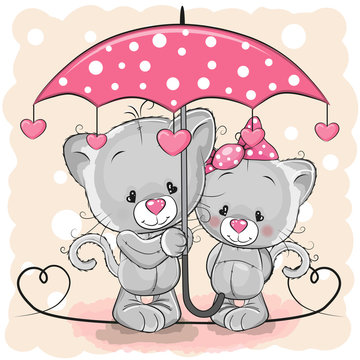 Two Cute Kittens with umbrella under the rain