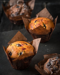 Homemade delicious chocolate cupcakes with fresh berries