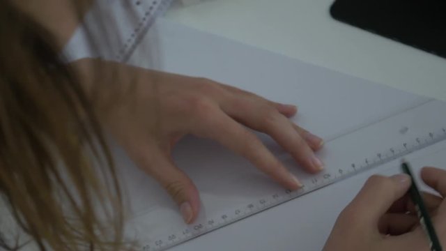 young Woman drawing Architecture sketch