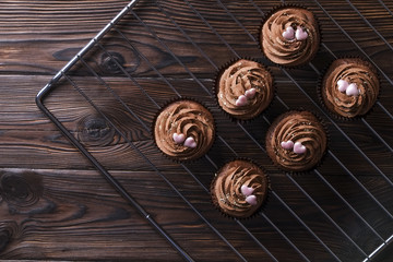 Tasty home made baked birthday muffins sweets. Yummy bakery products bad for figure. Unhealthy sweets. Holiday christmas, womens mothers day, happy valentine, february. Make up present for girlfriend