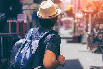 Young man traveler is visiting at Mongkok in Hong Kong