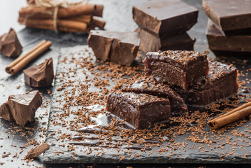 homemade chocolate brownies on grey background