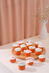 Yummy cupcakes. Valentine sweet love cupcake on table on light background