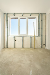 Workers are assembly gypsum wall.