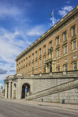 View of Royal Palace northern facade (Stockholms slott or Kungliga slottet, 1760) at Gamla Stan (Old Town). Palace is official residence and major royal palace of Swedish monarch. Stockholm, Sweden.
