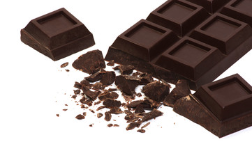 Broken chocolate bar isolated on white