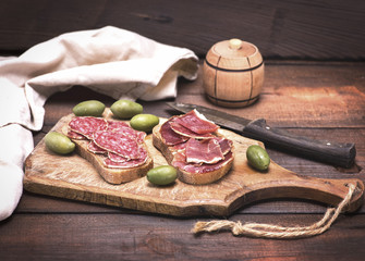 sandwiches with smoked sausage salami and jamon