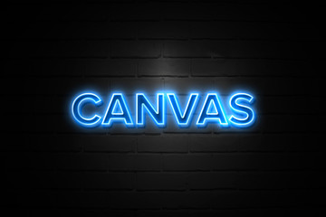 Obraz premium Canvas neon Sign on brickwall