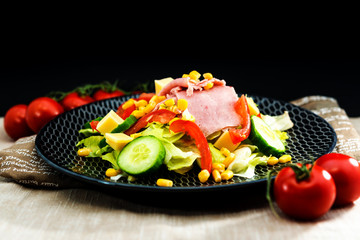 Delicious fresh salad and olive oil