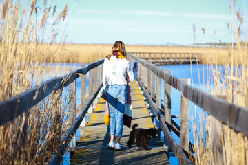 Woman walking with her phone