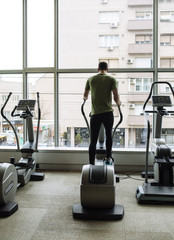 Man Workingout at Gym