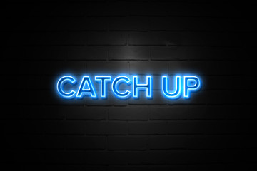 Obraz premium Catch Up neon Sign on brickwall