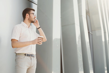 Confident businessman talking on phone