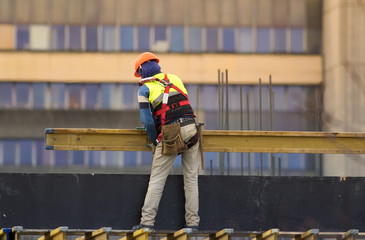 Worker build scaffolding at the construction  site