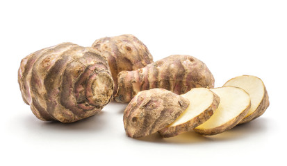 Three Jerusalem artichoke tubers with four round slices isolated on white background sweet crisp topinambur set.