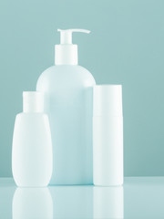 White cosmetic bottles set