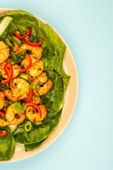 Fried Chinese Style Chilli Prawns On A Bed Of Steamed Pak Choi Greens