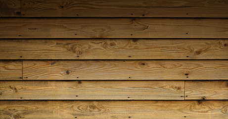 Fototapeta premium Dark stained wood boards with grain and texture. Flat wood background with parallel horizontal lines.