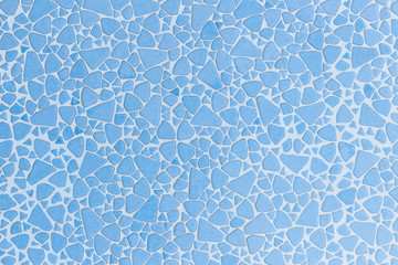 close up of wall mosaic tiles stone background