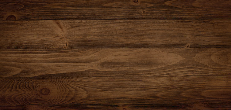 Dark stained wood boards with grain and texture. Flat wood background with parallel horizontal lines.