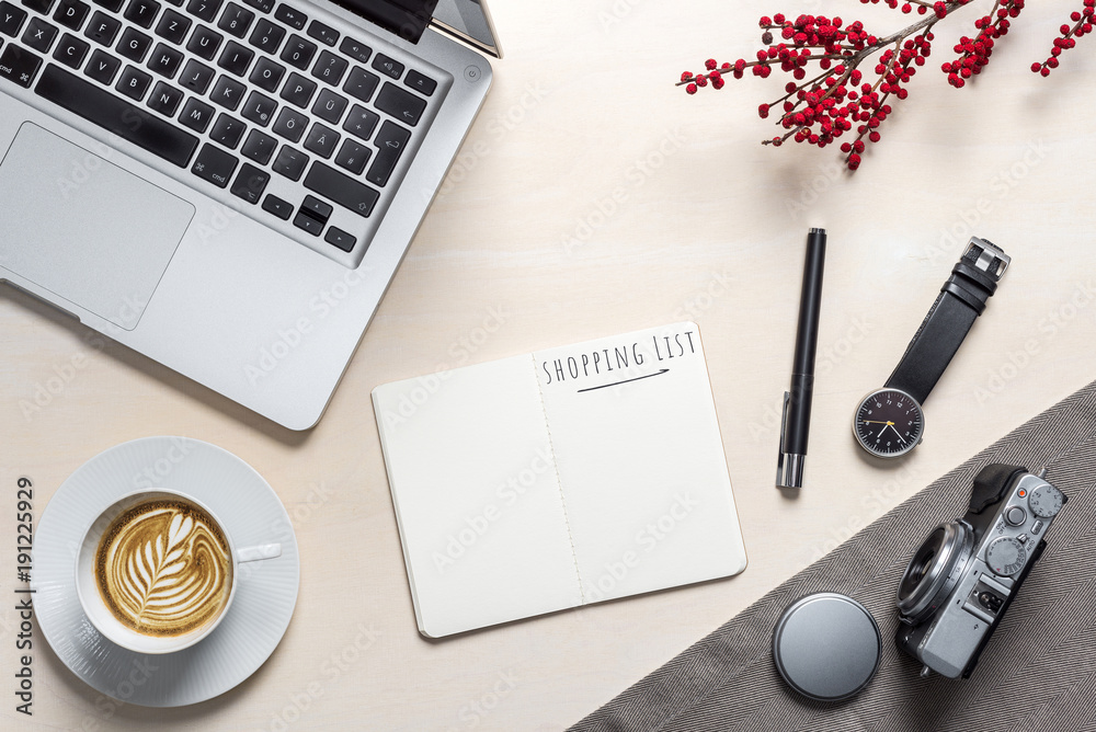 Wall mural shopping list written on open notepad in office as flatlay