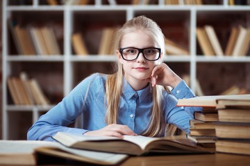 Teenage girl in a library