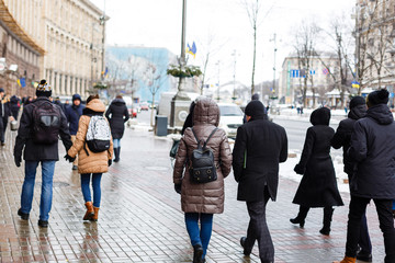 People walking from the work at the street in city