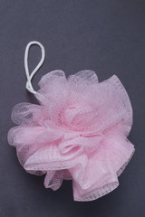 Rose washcloth on grey background