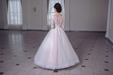 beautiful smiling bride before wedding ceremony