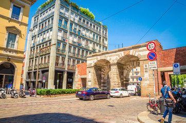 Fototapeta premium Beautiful street with ancient buildings in the center of Milan, Italy