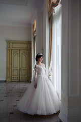 Fototapeta premium beautiful smiling bride before wedding ceremony