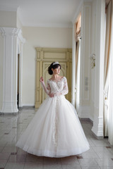 Fototapeta premium beautiful smiling bride before wedding ceremony
