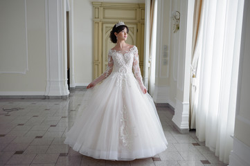 Fototapeta premium beautiful smiling bride before wedding ceremony