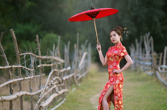 	
Chinese women wearing tradition red dress