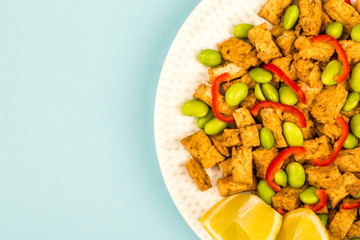 Deep Fried Chinese Style Vegetarian or Vegan Tofu With Spicy Red Chillies And Edamame Beans
