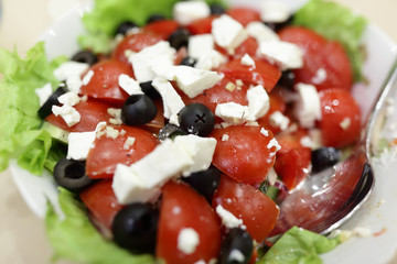 Salad with tomatoes and cheese