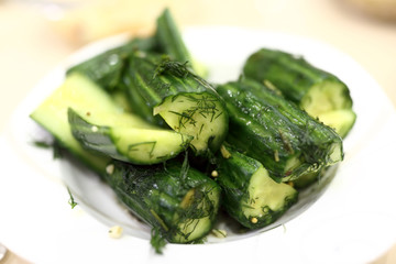 Salted cucumbers on plate