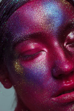 Creative make-up of colored powder closeup. pink pigment, shadows, paints
