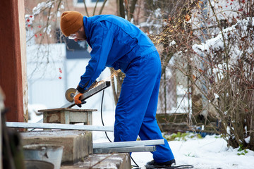 Full length shot of a electrician technician working outdoors installing solar panels profession occupation job green energy source alternative environmental station saving efficient photovoltaic