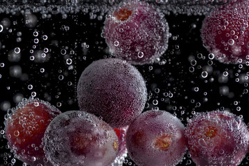 Red grapes in soda water. 