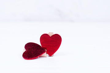 Two red hearts on a white background for valentine's day