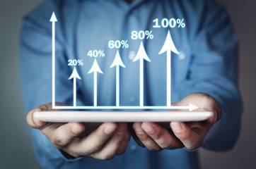 Businessman with business growth graph.