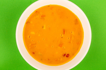 Bowl Of Vegetarian Butternut Squash Soup With Red Peppers