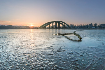 sunrise in the lake with bridge 