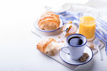 Croissant with Jam Espresso Coffee and a glass of Orange Juice Tradition of the Sunset Morning Baking Sweet Dessert